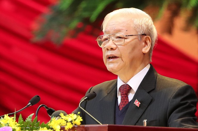 Đồng chí Nguyễn Phú Trọng đọc Báo cáo của Ban Chấp hành Trung ương khóa XII về các văn kiện trình Đại hội XIII của Đảng